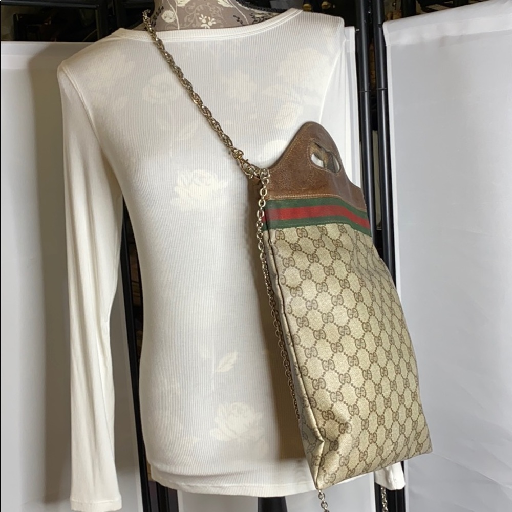 1970's Gucci Hand Foldover Crossbody Wine Flat Bag